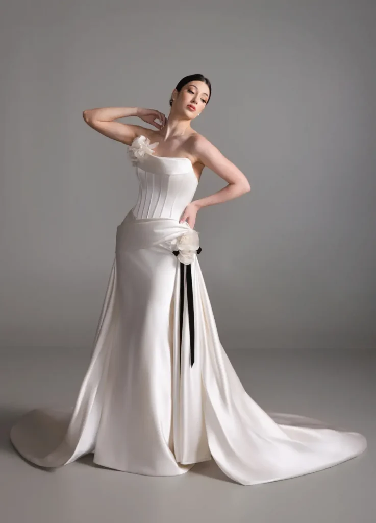 Blanc De Perez by Lazaro Wedding dress. Strapless, basque waist, corset bodice with fitted skirt and floral detail.