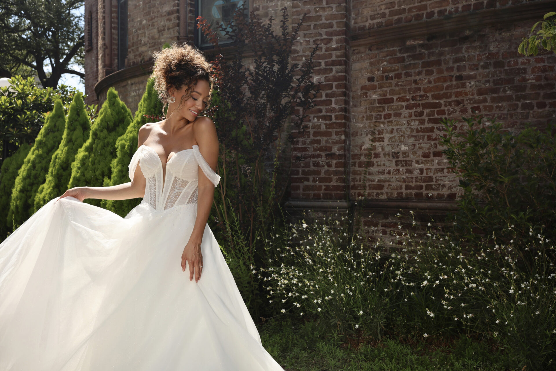 Essense of Australia D4130 Enchanting Princess A-Line Tulle Wedding Dress with Sheer Corset Bodice and Off-the-Shoulder Straps and Pearl Accents in Denver, Colorado at The Bridal Collection