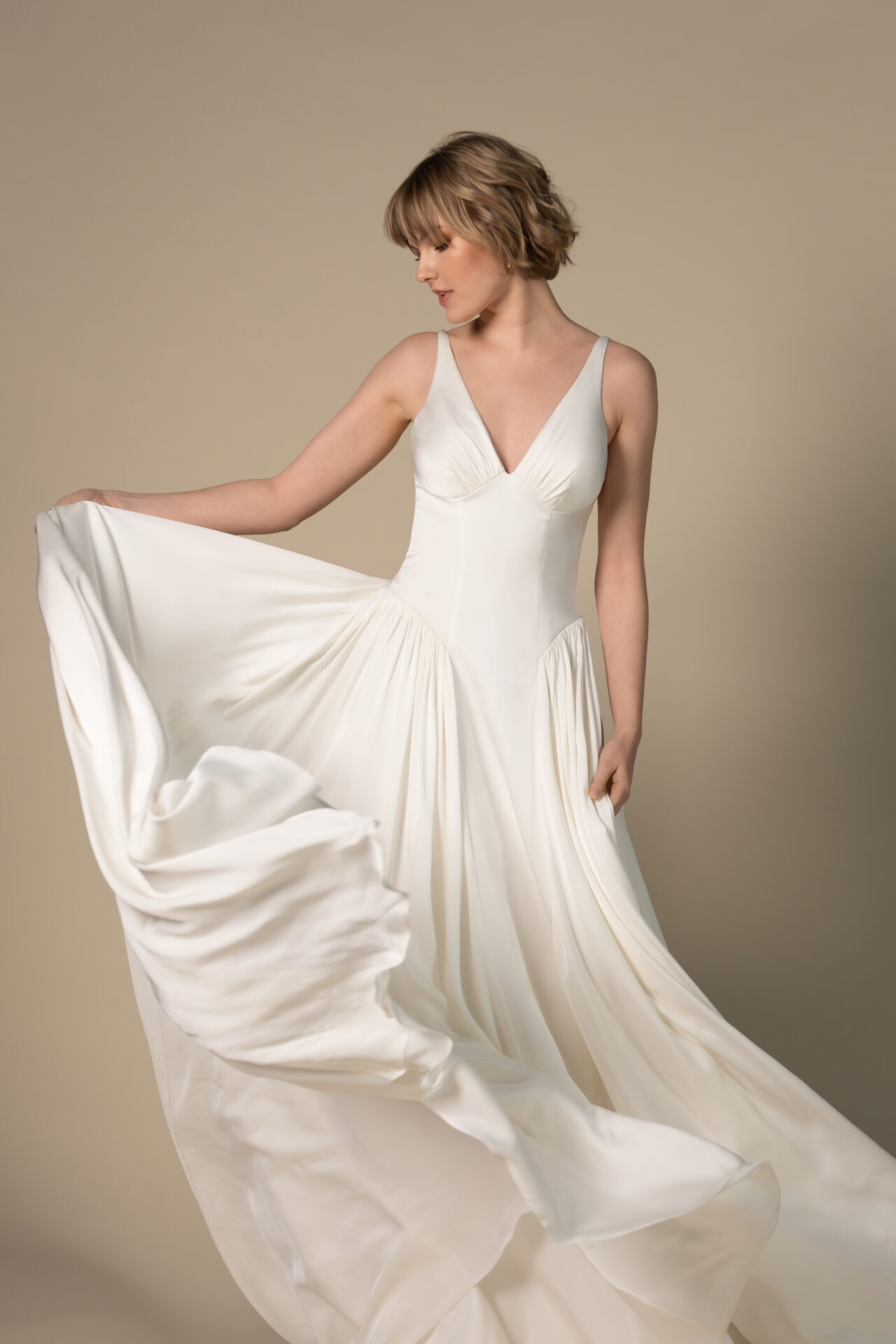 All Who Wander Gisele Bridal Gown Simple A-Line with Deep V-Neckline and Shoulder Straps Wedding Dress in Denver, Colorado at The Bridal Collection