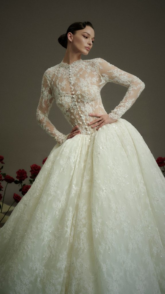 Nicole and Felicia Luxe NF120 ballgown. Removable long sleeve jacket, beaded lace ballgown.