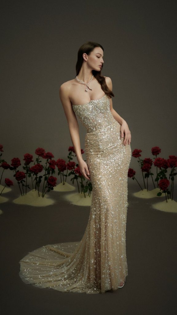 Nicole and Felicia Luxe NF121 beaded fit and flair strapless wedding dress